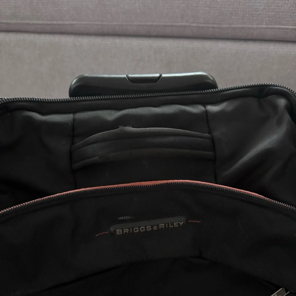 Briggs & Riley Black Rolling small traveling bag